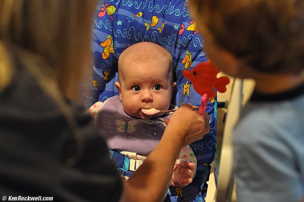 Baby Katie eats her first food