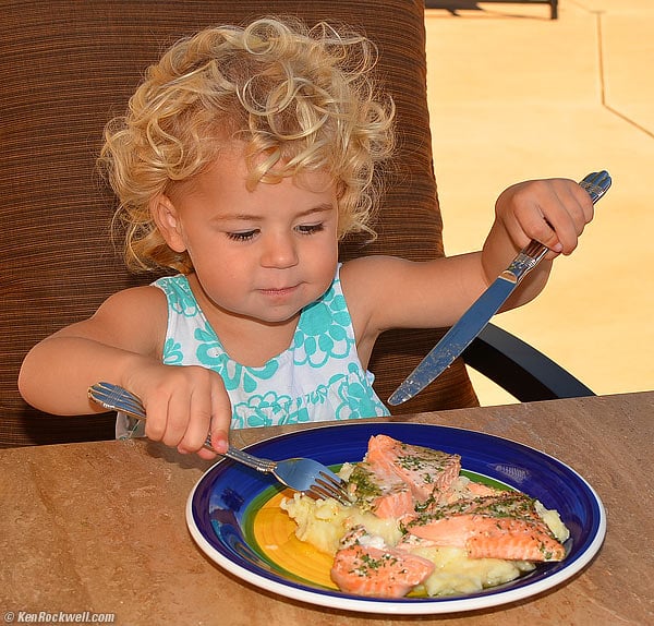 Katie Eating Salmon 08 November 2010