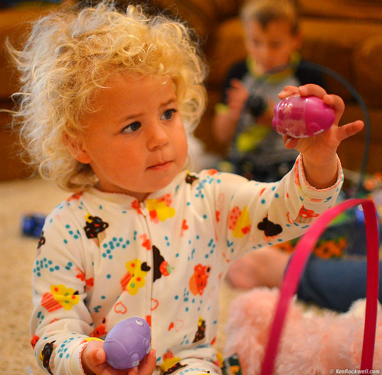 Katie inspecting an Easter egg.