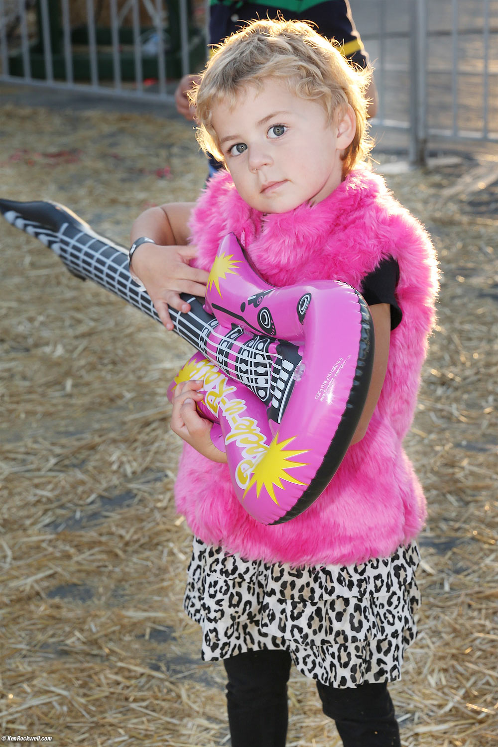 Katie scores a pink guitar