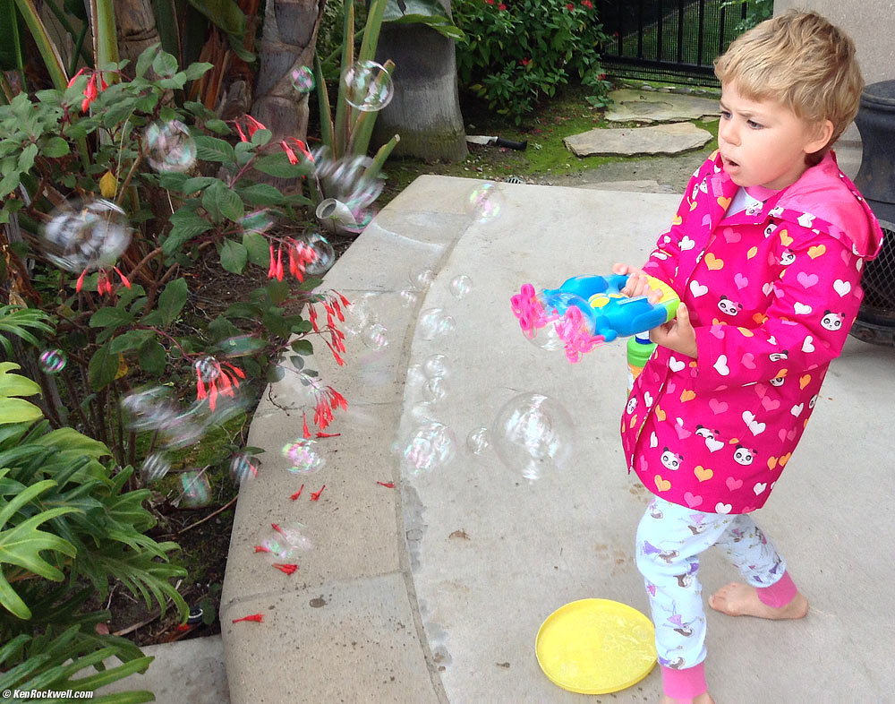 Katie blows lots of bubbles