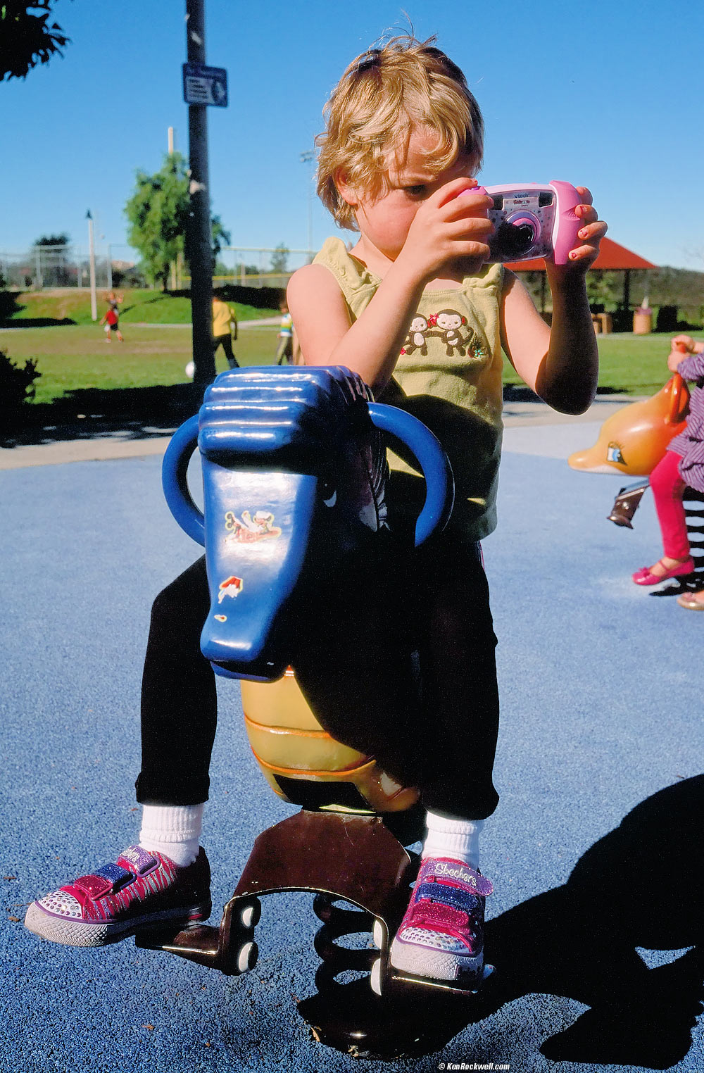 Katie at the park with her VTech 1227 camera. 