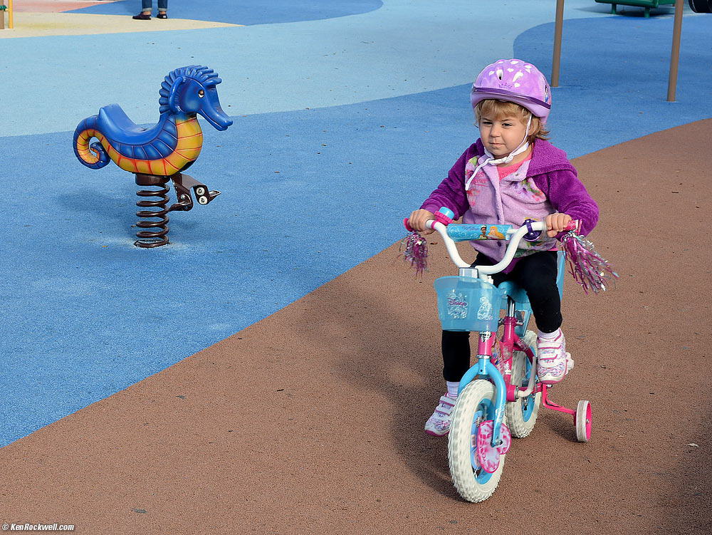 Katie biking at the park.