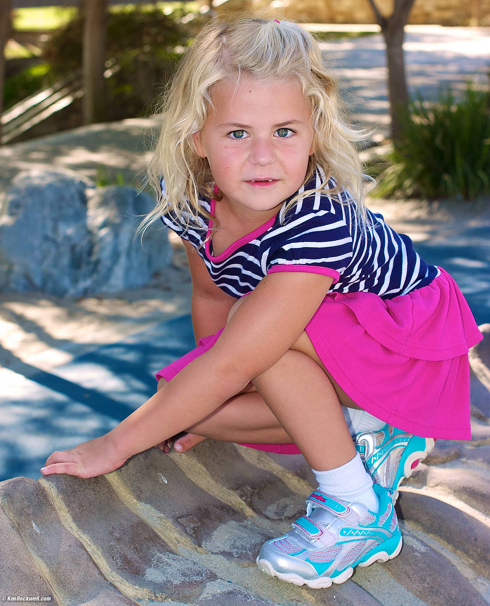 Katie on the big whale skeleton at the dinosaur park. 