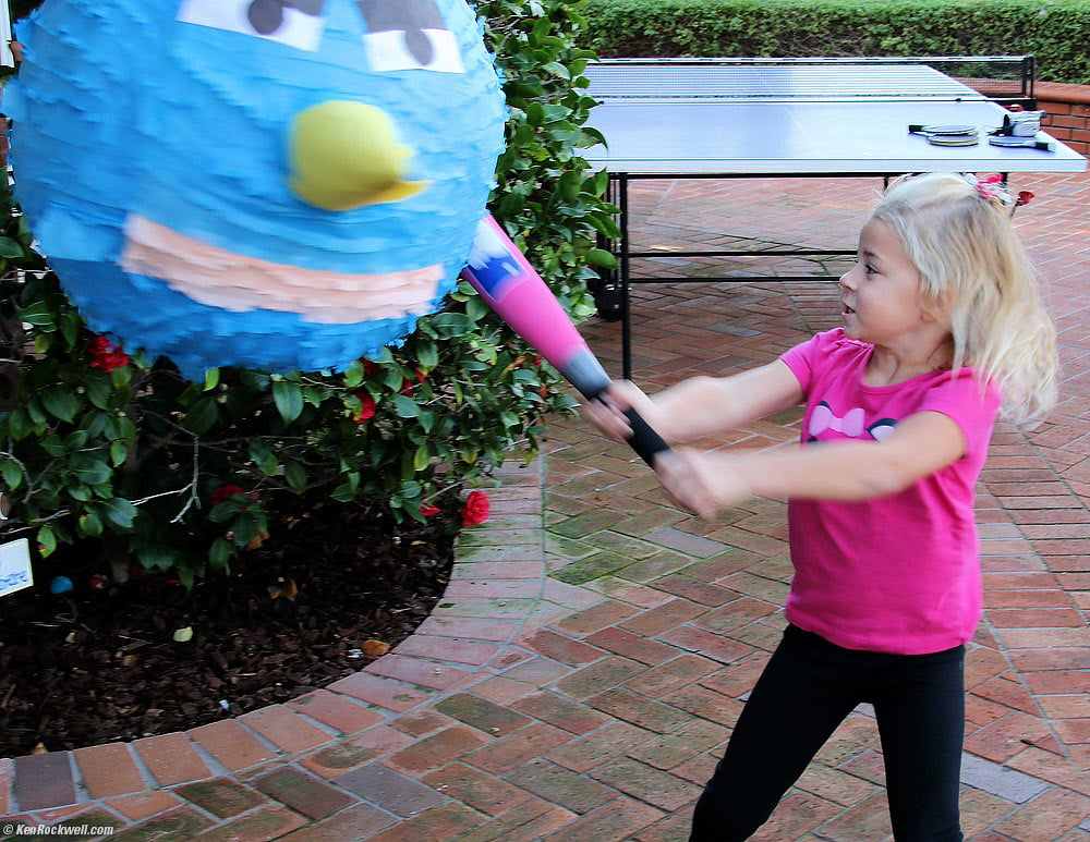 Katie slams the piñata
