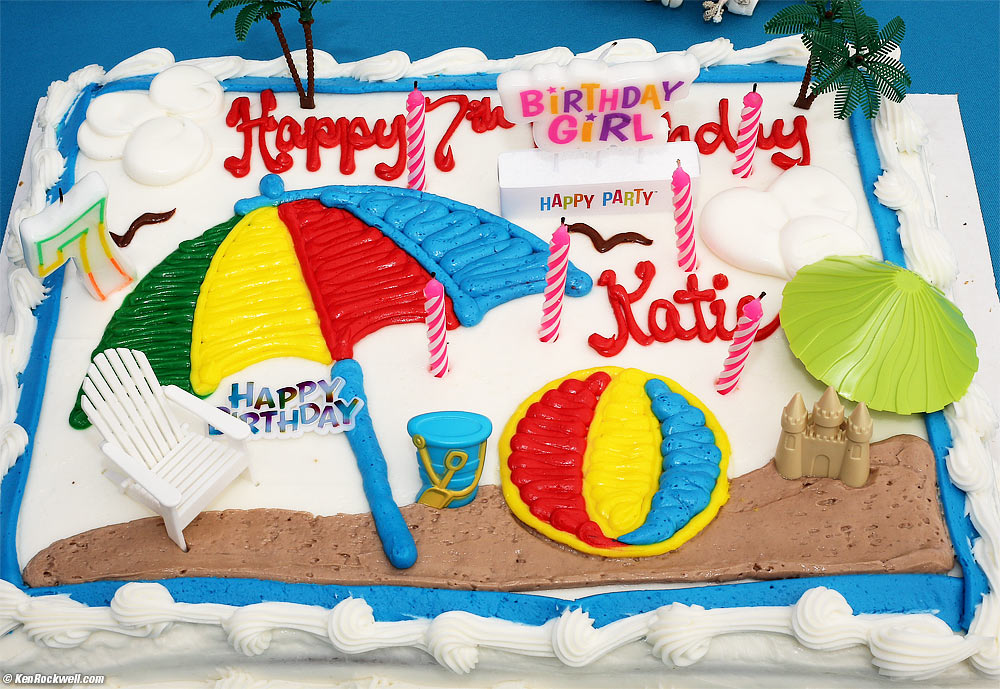 White birthday cake with beach.