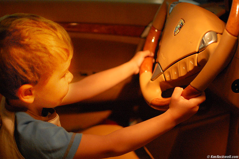 Ryan driving a Porsche