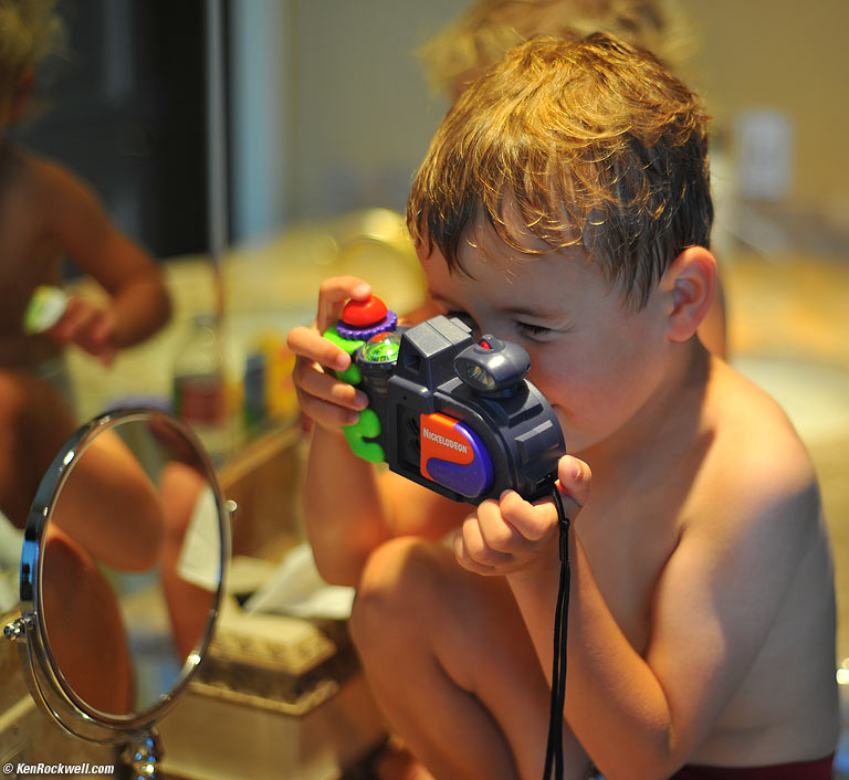 Ryan and the Nickelodeon Photo Blaster 144-shot camera.