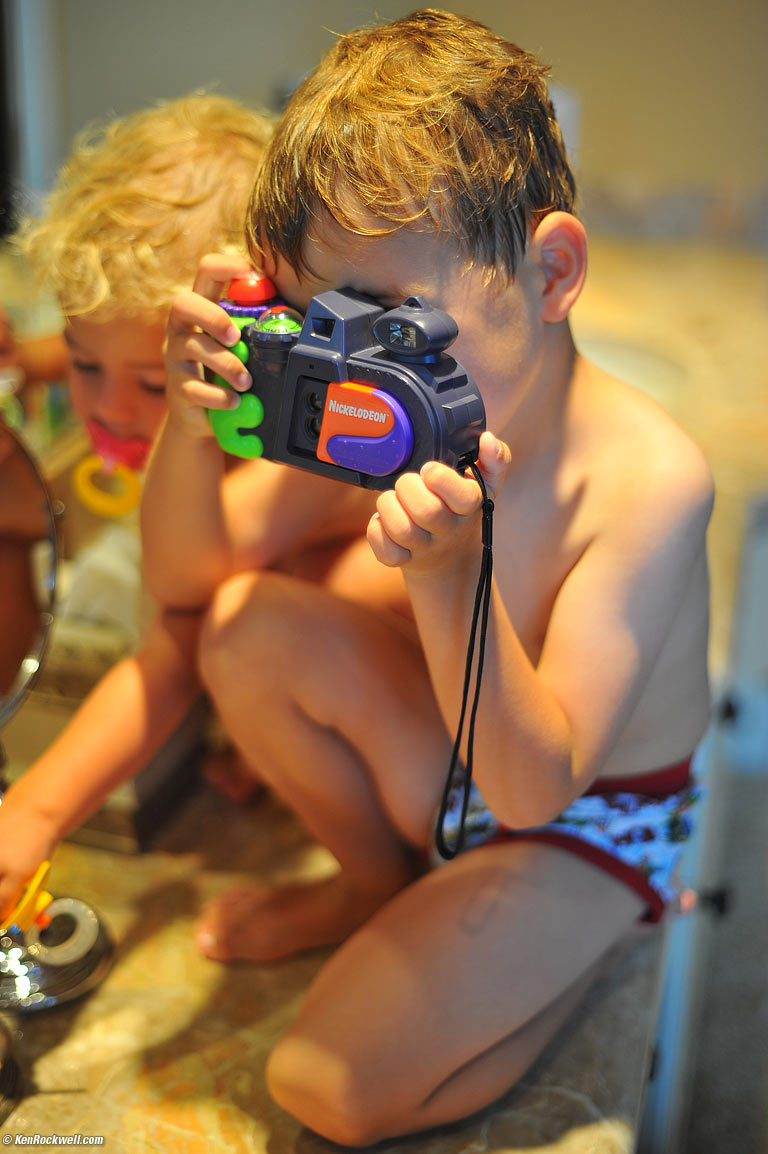 Ryan and the Nickelodeon Photo Blaster 144-shot camera. 
