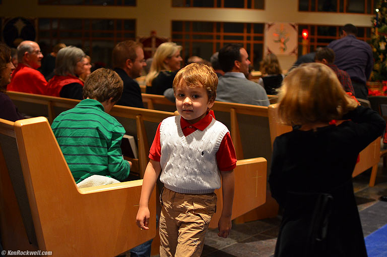 Ryan returns from the Childrens' Message at the front.