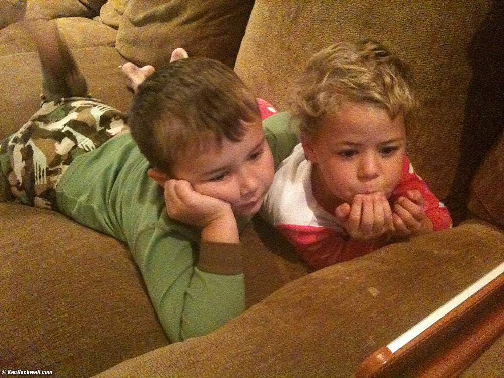 Ryan and Katie watching Spiderman on the iPad.