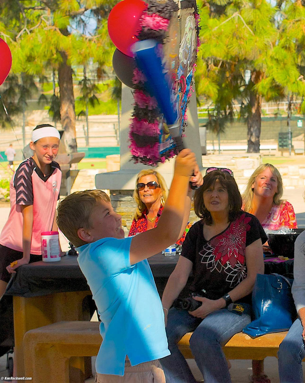Ryan slams the Piñata at Skyler's party the Dinosaur Park.