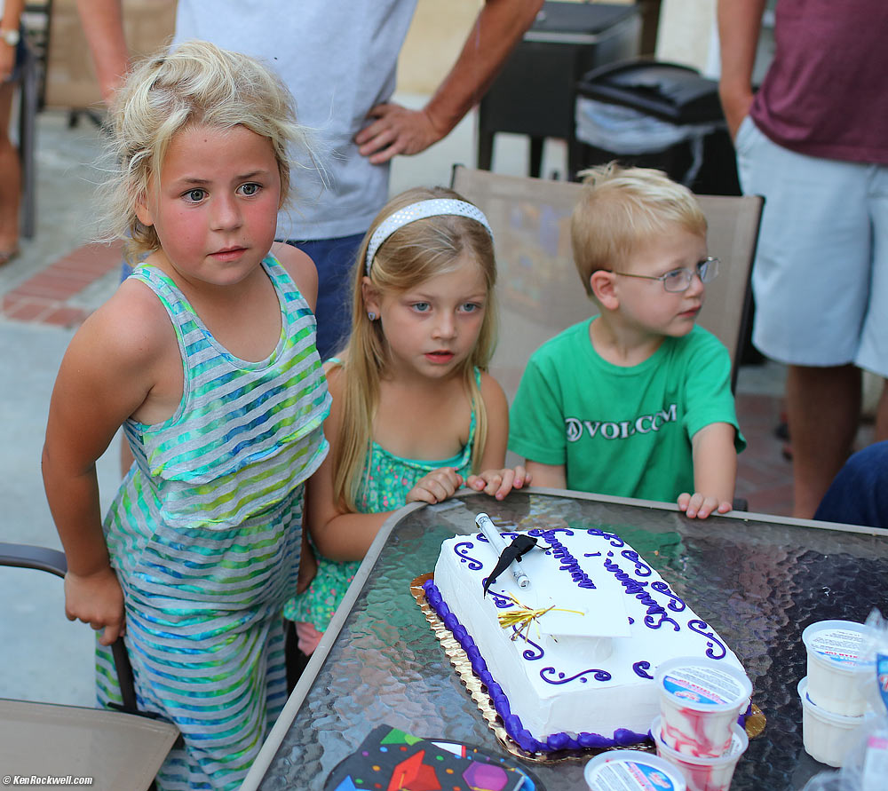 Kids and birthday cake