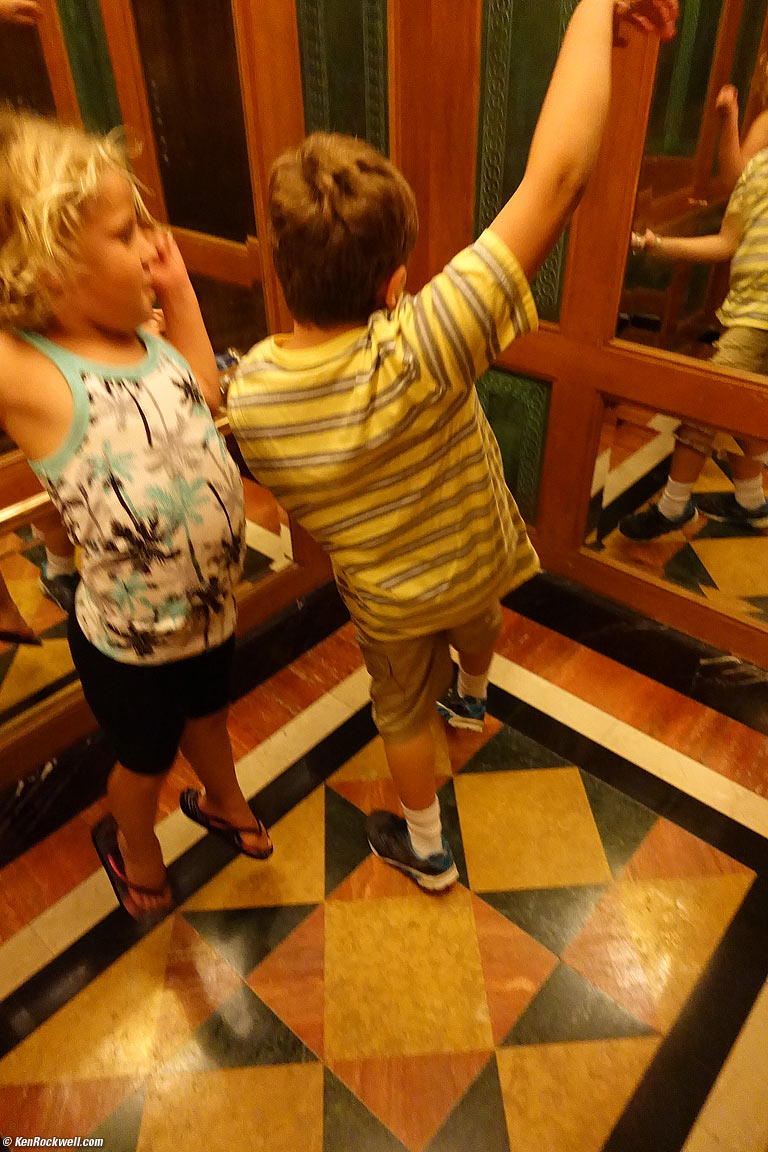 kids jumping in an elevator