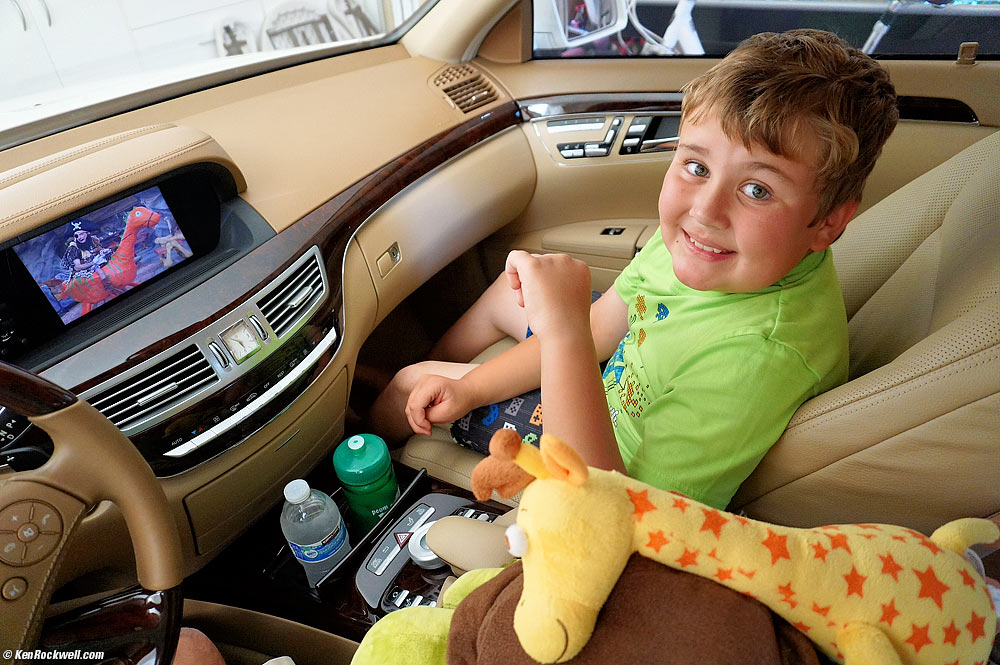 Ryan in the back of a Mercedes S550