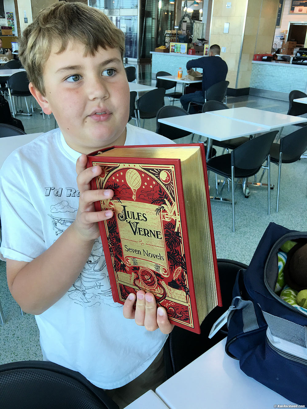 Ryan brings some light reading, Seven Novels by Jules Verne, for the plane