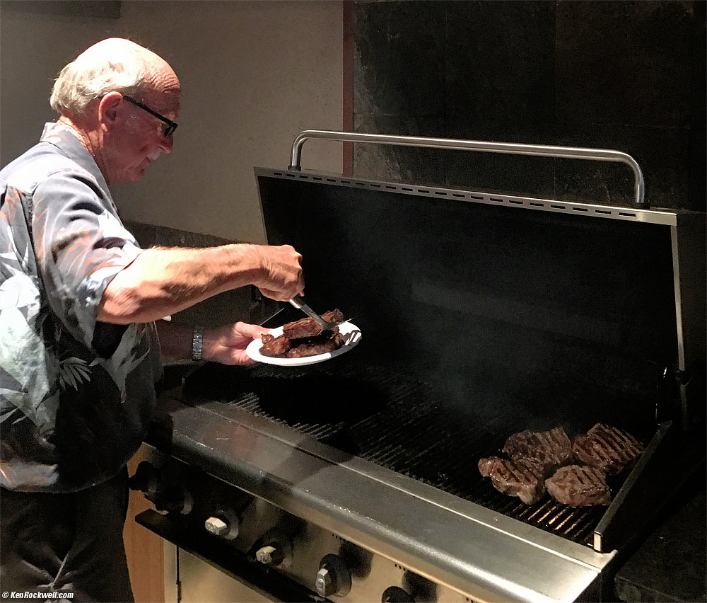 Pops grills steaks out on the lanai