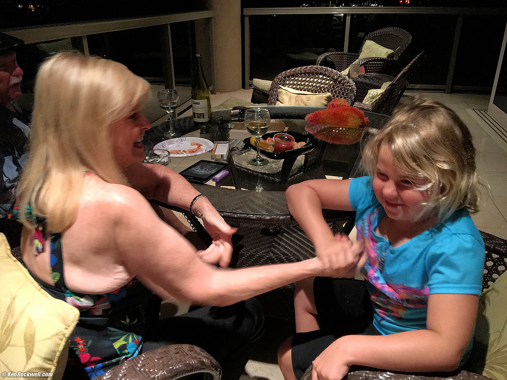 Katie challenges Noni to an arm wrestle