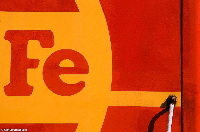 Fe