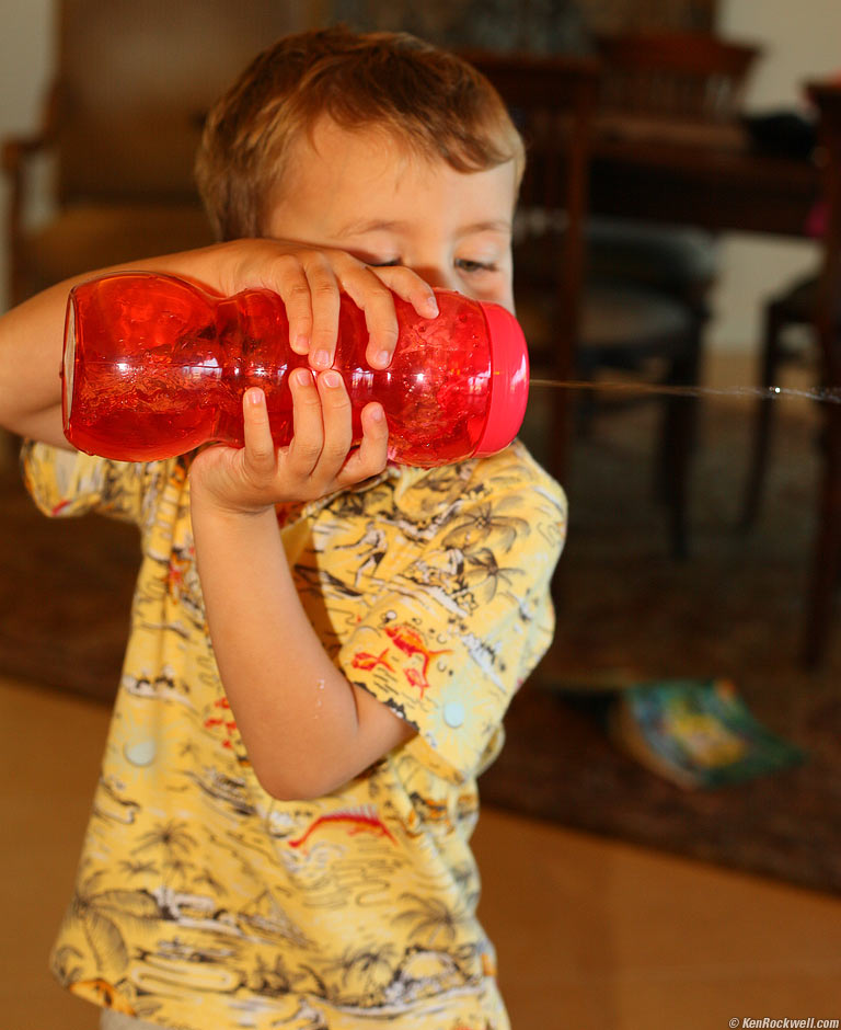 Ryan squirting his silly straw cup, Wailea, Maui. 8:13 AM.