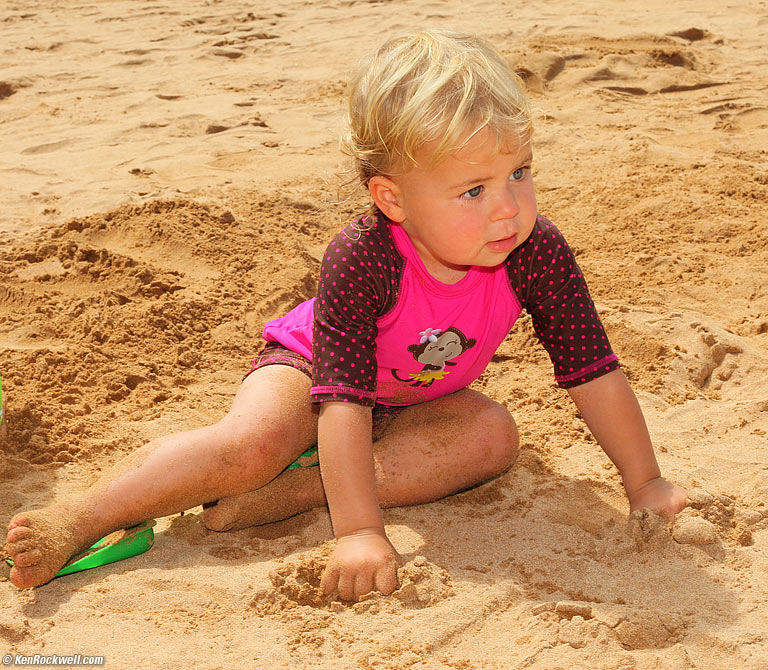 Katie enjoys the sand, Wailea Beach, Maui. 10:20:01 AM.