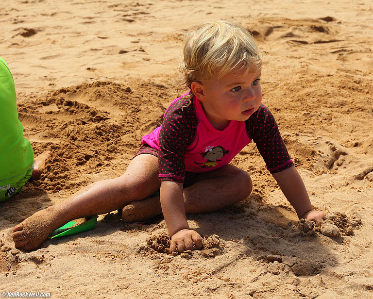 Katie enjoys the sand, Wailea Beach, Maui. 10:20:03 AM.