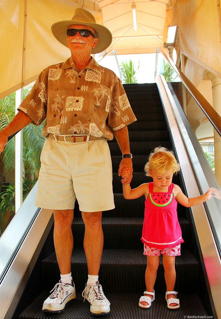 Playing on the elevator with Pops, 11:48 AM. 