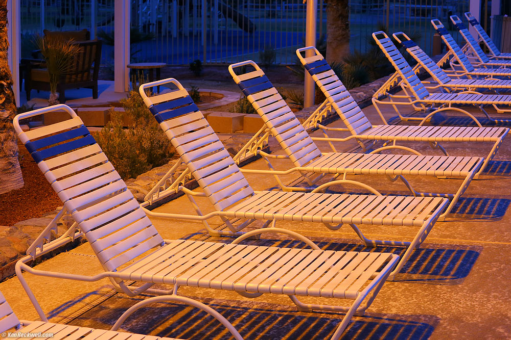 Deck chairs by the warm spring-fed pool, Furnace Creek Ranch, Death Valley, California 5:32 PM. 