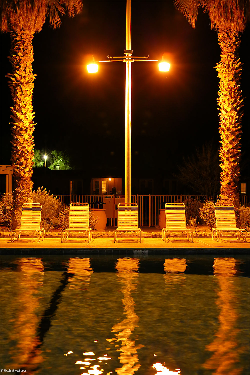 Deck chairs by the warm spring-fed pool, Furnace Creek Ranch, Death Valley, California 6:05 PM.