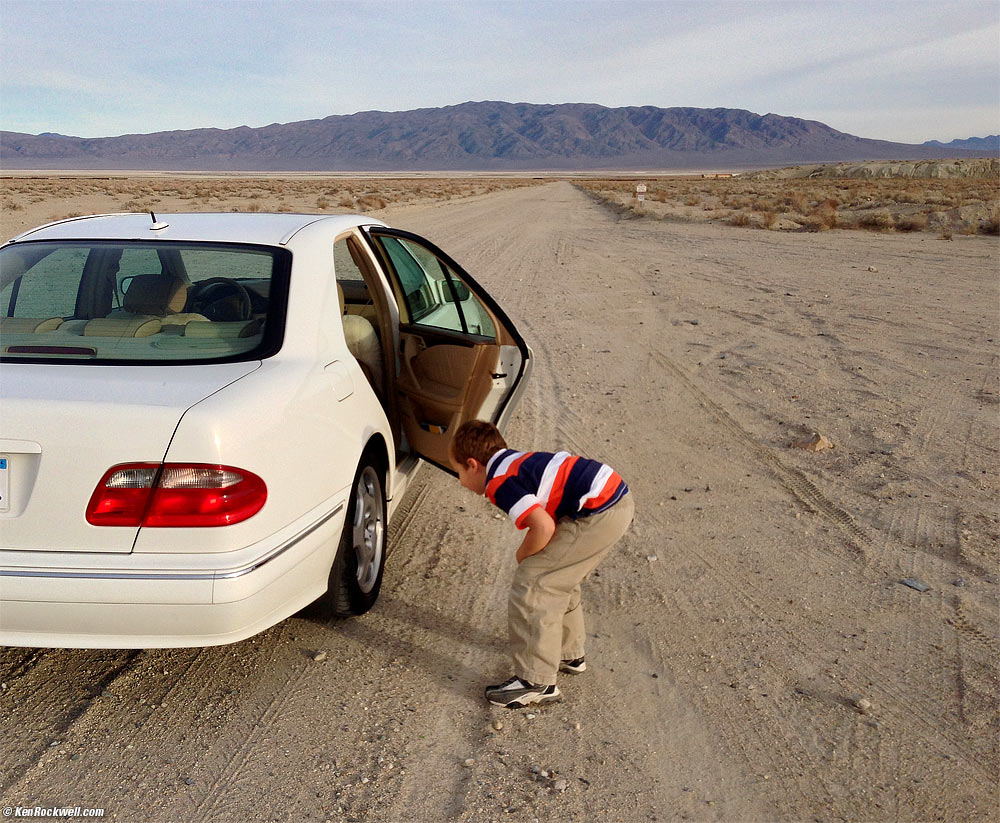 Ryan looking at the tires, Trona, California 4:08 PM