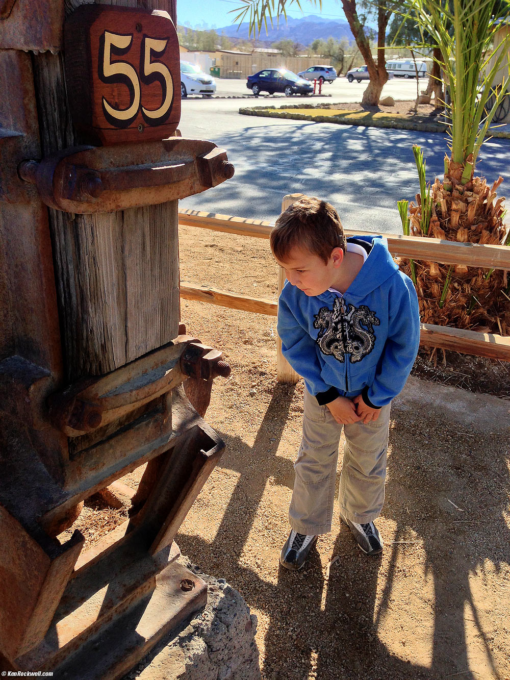 Ryan looking at the stamp mill at the museum, Furnace Creek Resort, Death Valley, California 10:27 AM.
