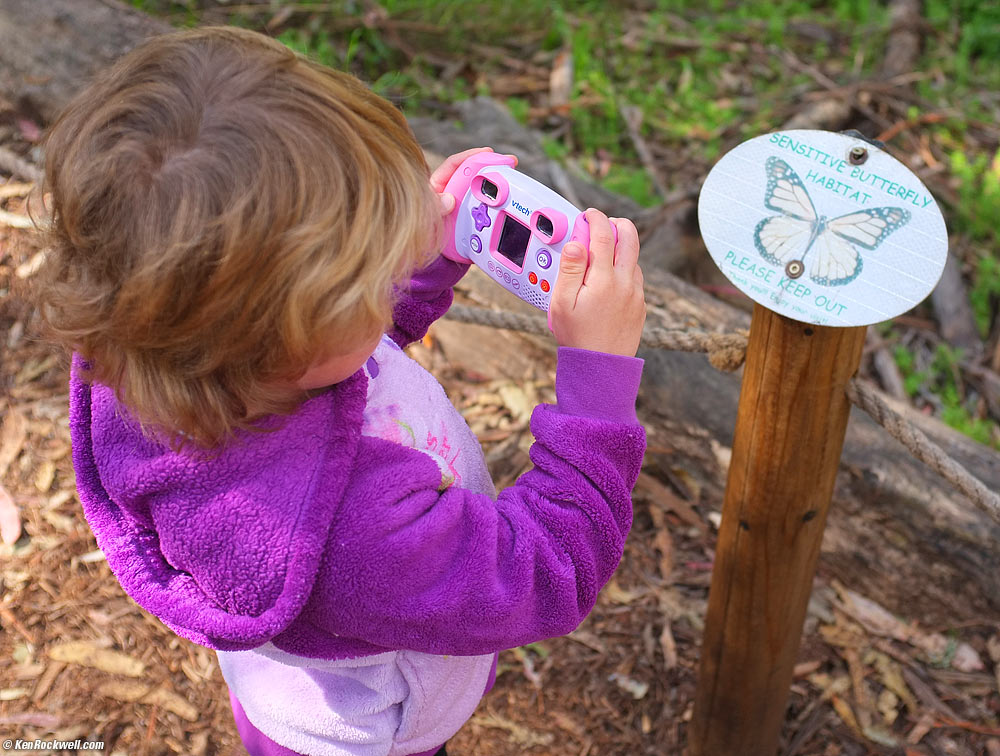 Katie and her pink VTech 1227 KIdizoom camera, 10:32 AM.