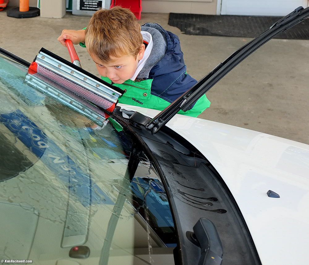 Ryan washes the Volvo window, 11:19 AM