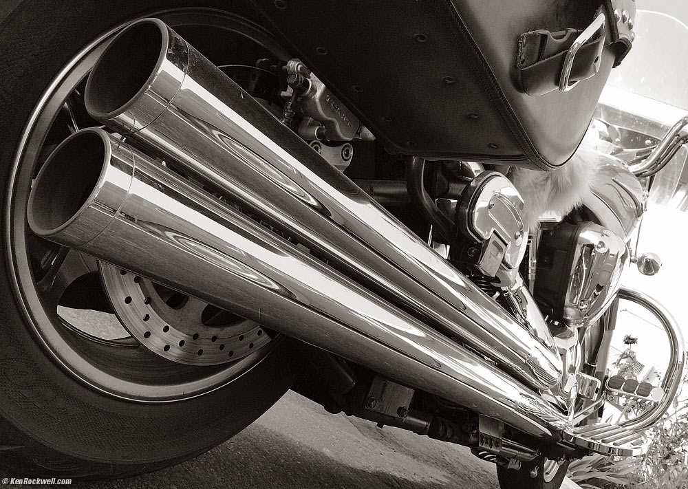 Motorcycle exhaust pipes in black and white