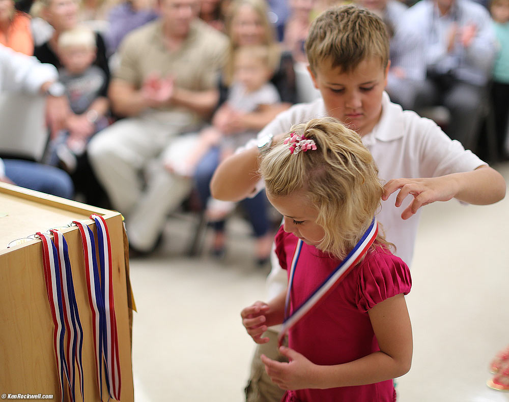 Ryan gives Katie her reading award
