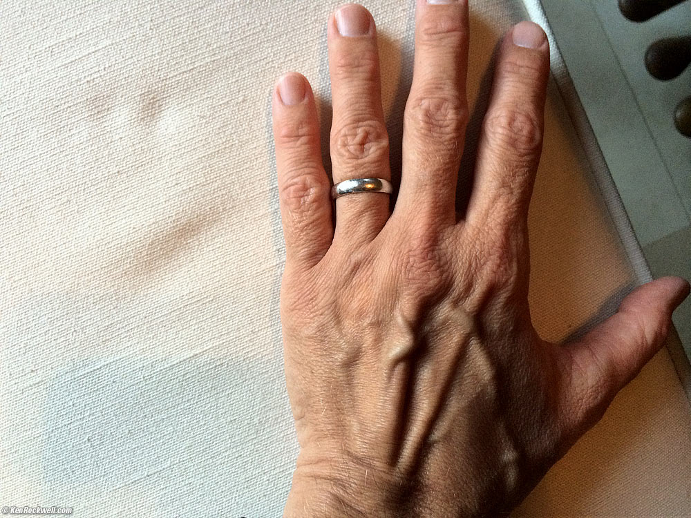 Imprint of Katie's hand next to Dad's on the Kimball piano bench, Ranch House