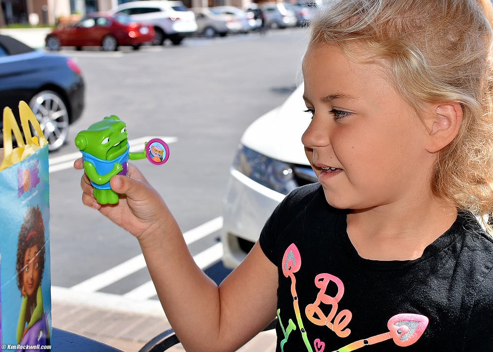 Katie and a new Happy Meal toy.