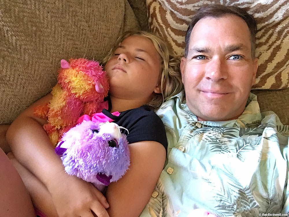 Katie sleeping on dad at the Ranch House