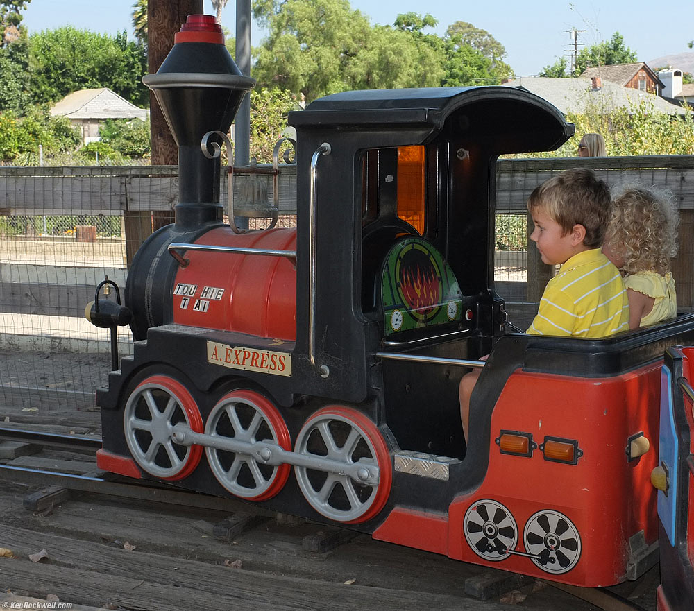 Ryan pushes the green button on the choo-choo train