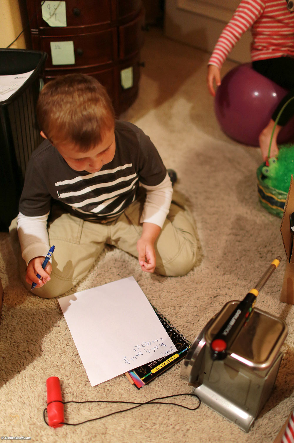 Ryan weighing his electronic drum stick