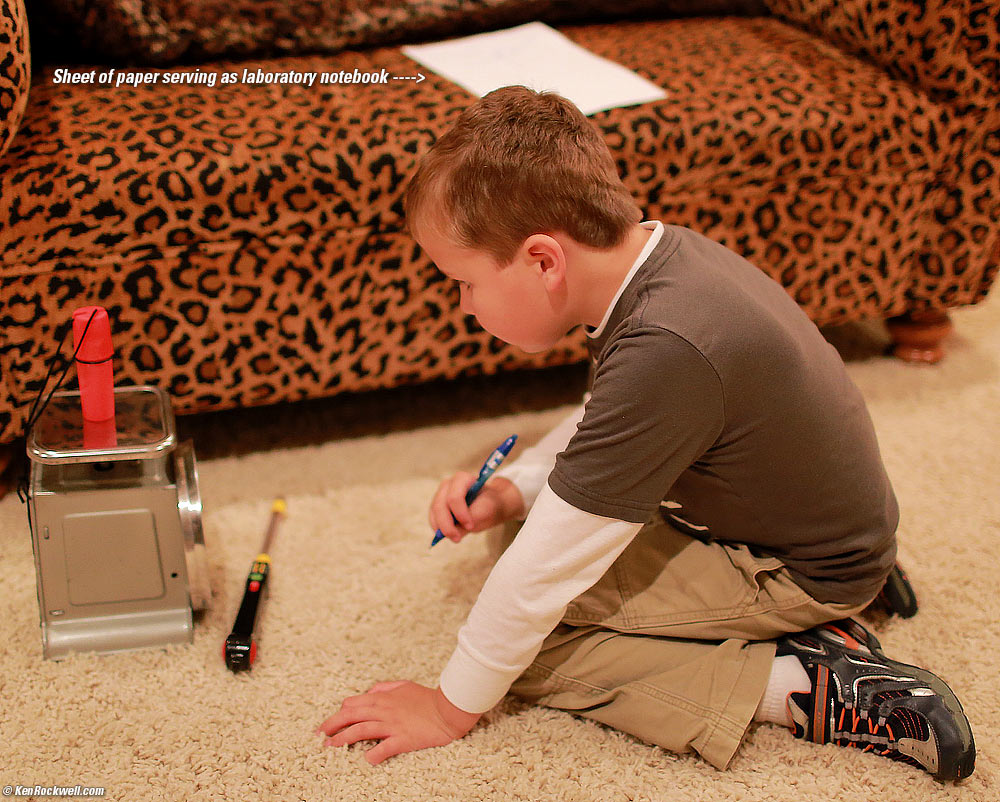 Ryan weighing his new collapsible beach ball