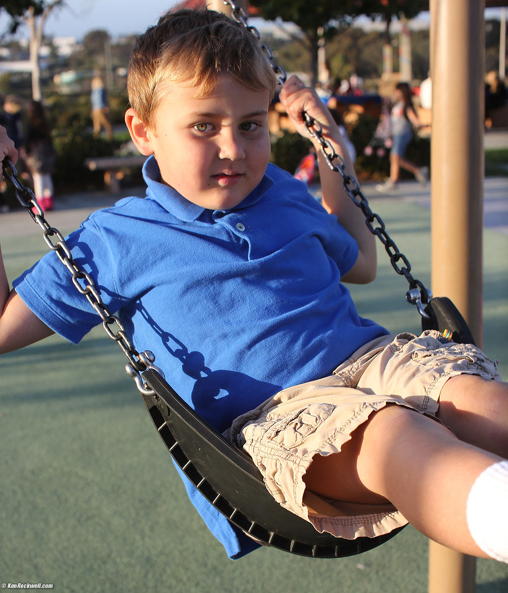 Ryan swinging at the park.