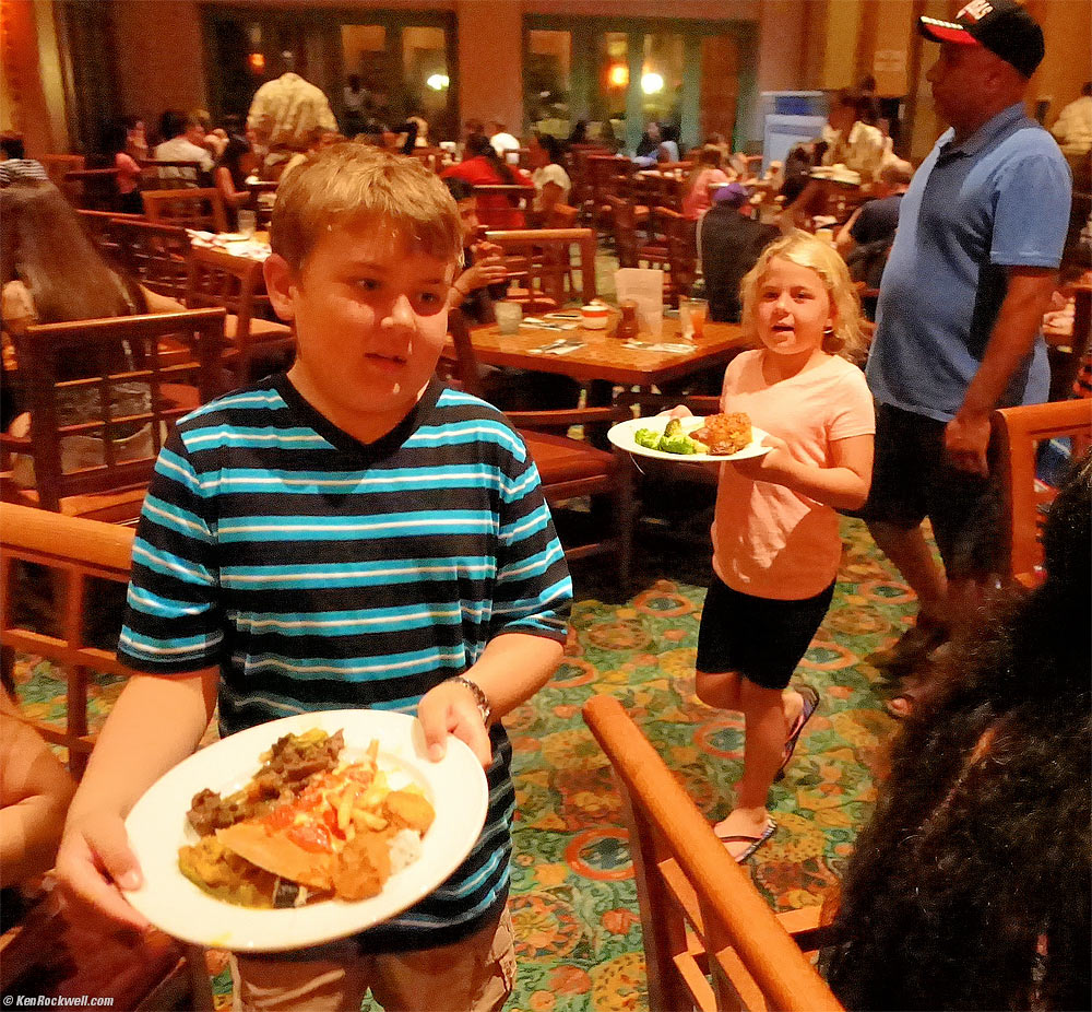 Ryan and Katie return to the table with their food