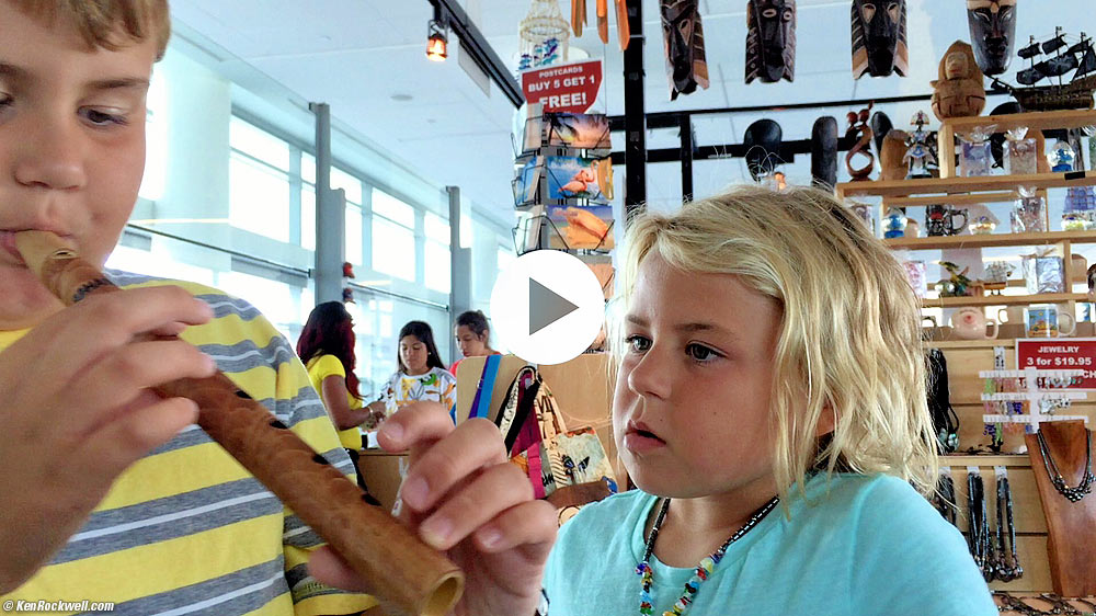 Kids playing flutes at Nassau airport