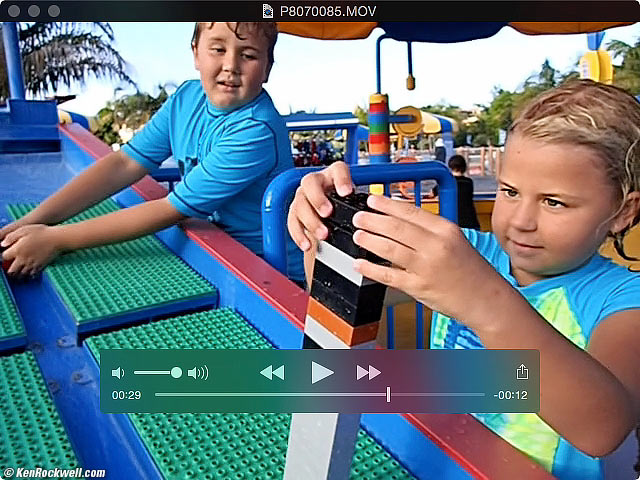Dad chases the kids down the water slide