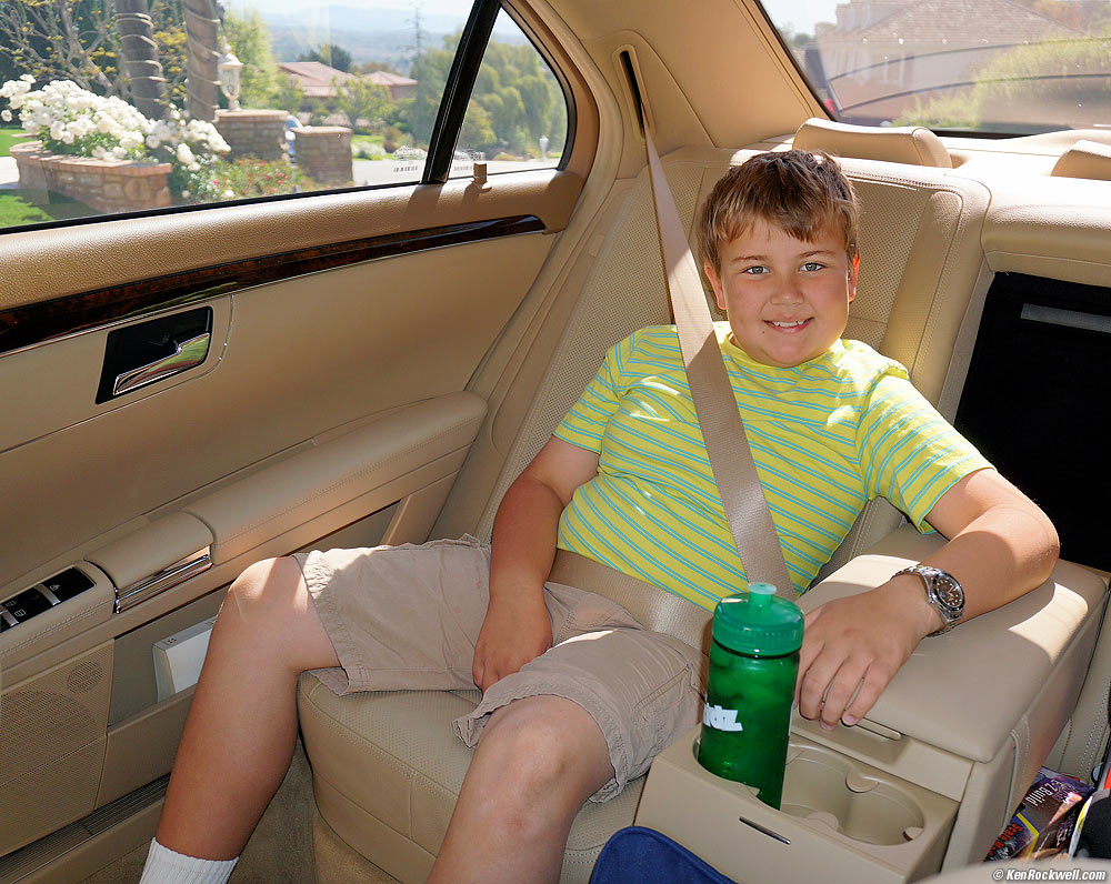 Ryan in the back of a Mercedes S550