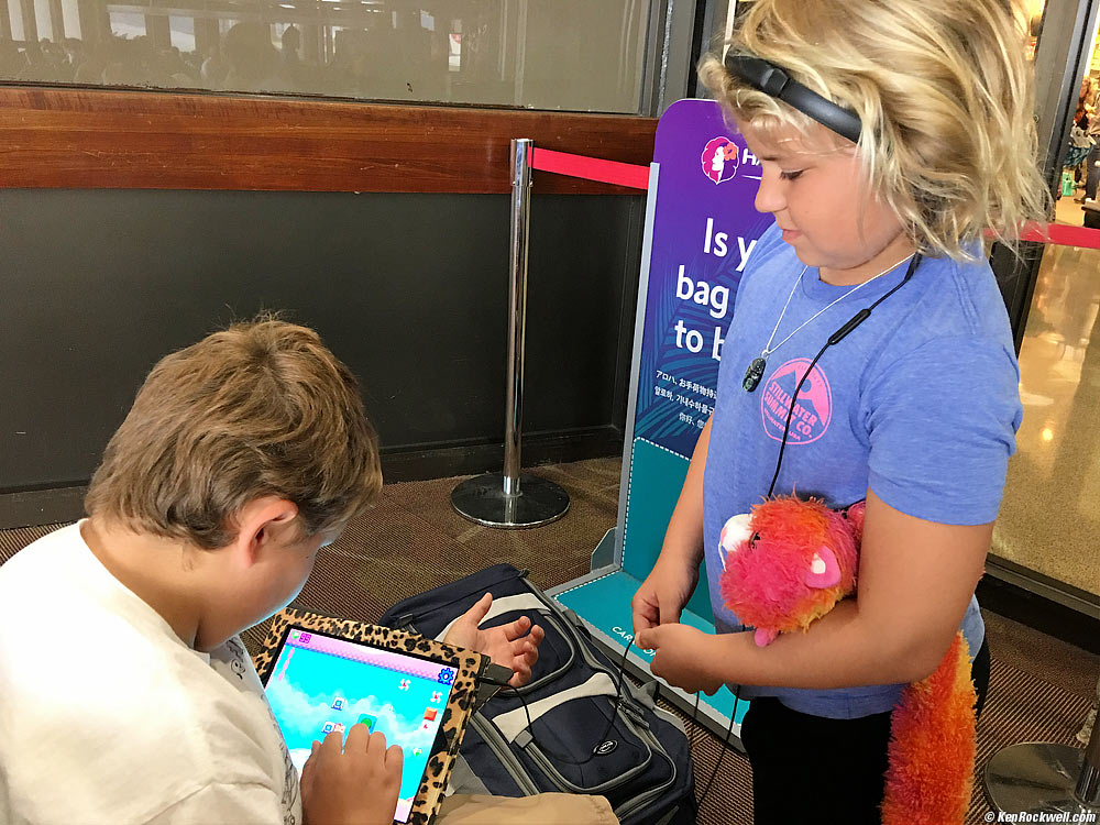 Ryan helps Katie with her iPad
