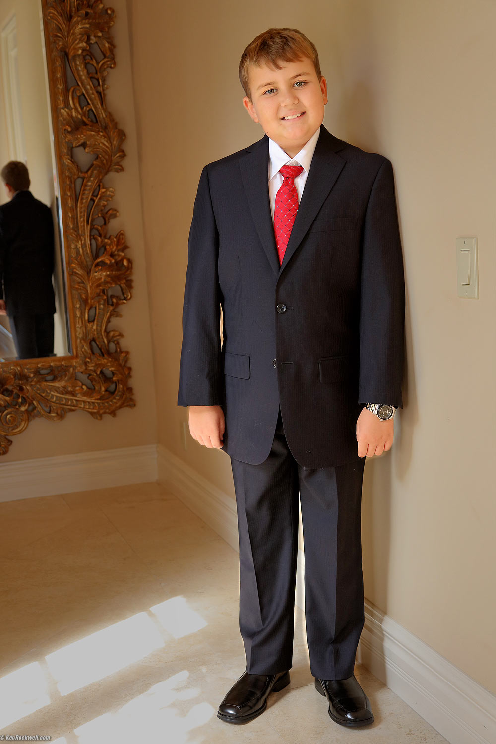 Ryan in a suit.