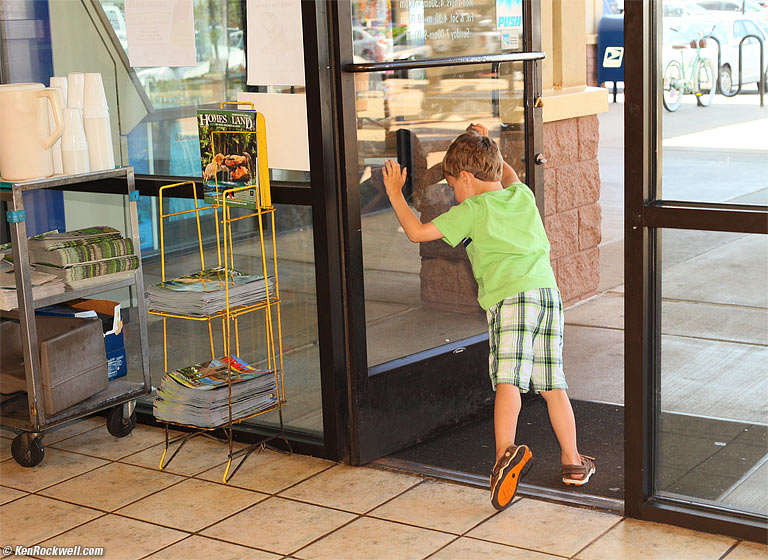 Ryan opens the door at L&L Drive-Inn, Kihei, Maui. 10:27 AM.