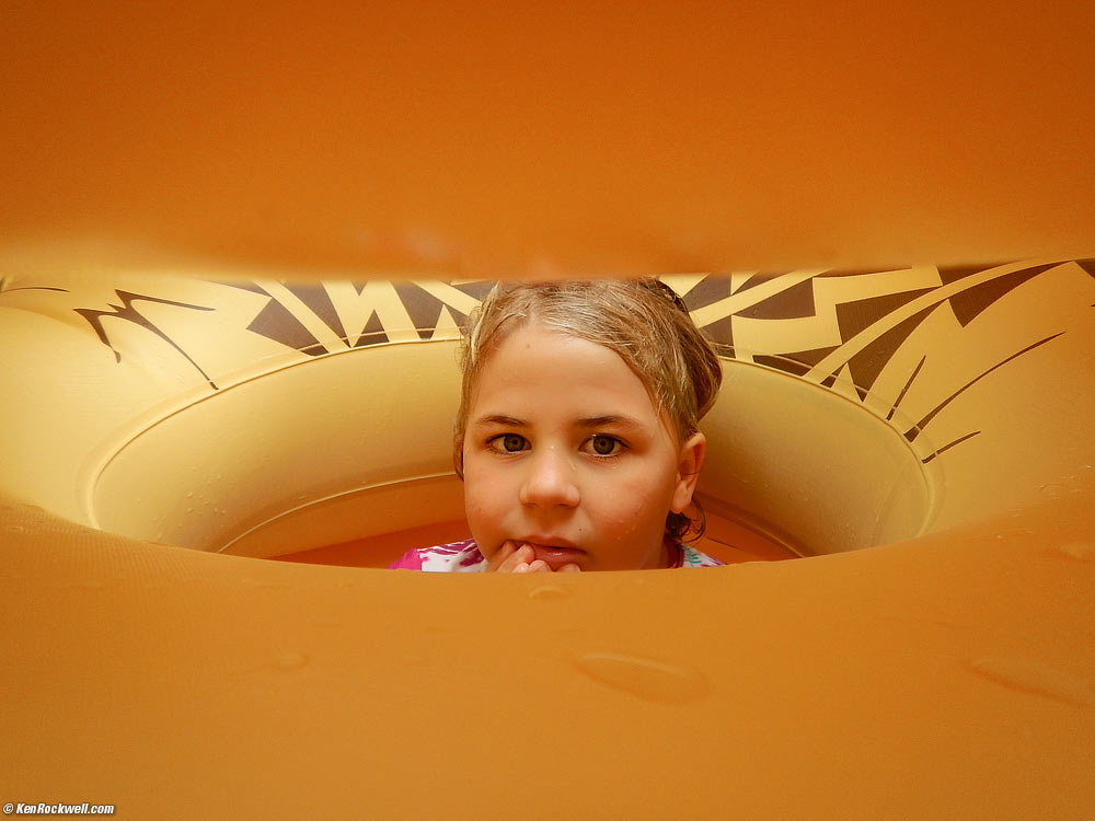 Katie in a pile of inner tubes